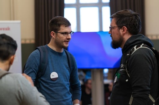 Two men talking